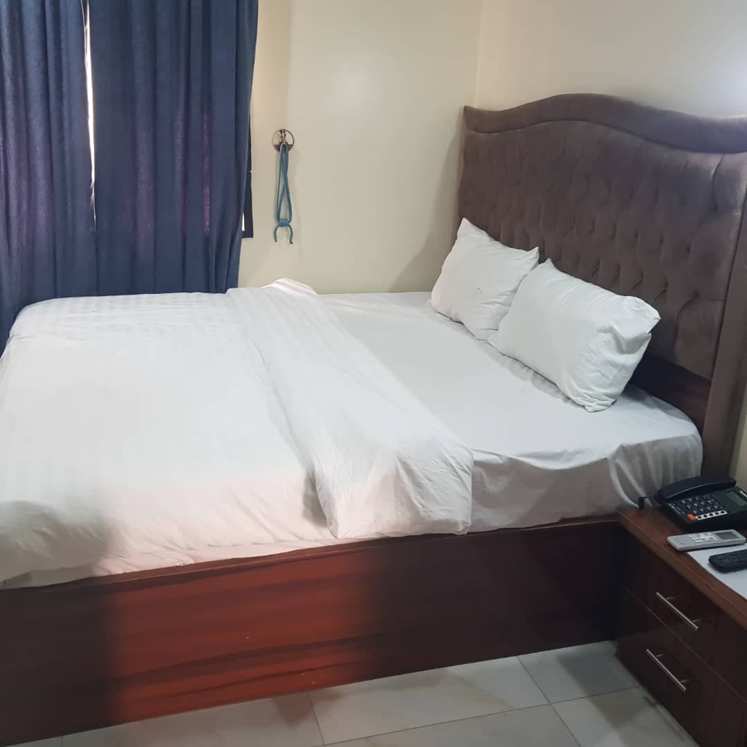 Presidential Suite entertainment and seating area at Nectar Hotels and Suites